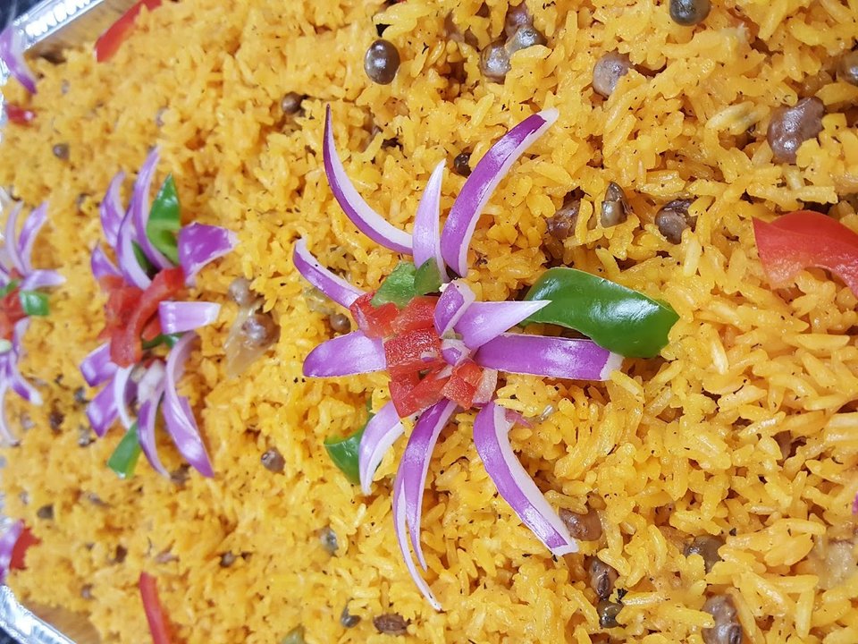Hearty meat dishes arranged on white plates.